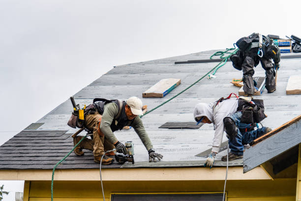 Professional Gutter Installation technician working in Garfield, KY